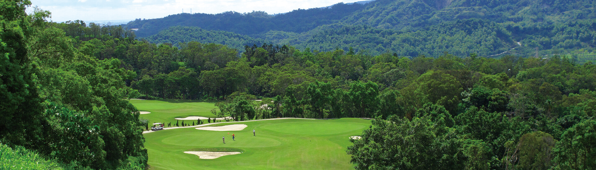 scenic view of the lush green fairways and rolling hills